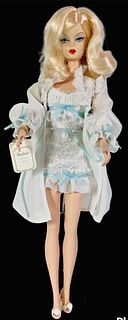 The Ingenue Barbie is another BFMC that has a Silkstone body and has a beautiful white lingerie with blue ribbons for accents. She has been removed fr