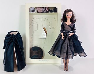 From the BFMC, Brunette Silkstone Barbie wearing Midnight Mischief, a black cape covering her black and cream dress. The Barbie did not come with this