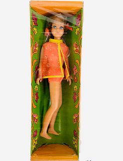 Twist and Turn Skipper in her original box without plastic. Skipper is in an orange bathing suit, orange ribbons in her hair, very long eyelashes and 