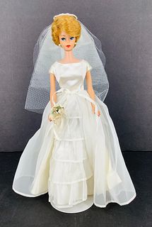 Bubble cut Barbie. Wearing #947 "Bride's Dream" missing garter and shoes, spotting on back of dress.