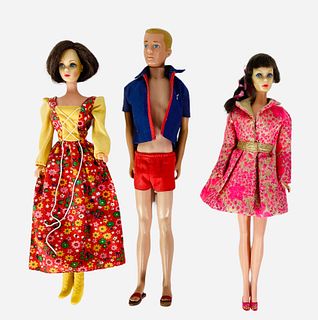 (3) dolls including(1) Bendable Legs Ken which will not hold a pose by bending legs. Hes wearing his bathing suit. (1) TNT Brunette Barbie. wearing Sp