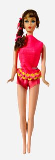 Talking Brownette Barbie. Hair in original set, legs and arms remain intact, talking mechanism no longer works. Doll and swimsuit have great color.