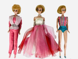 (3) Barbies (1) Beautiful Blond American Girl in original bathing suit and blue heels. Her legs click (3) times and face is bright and beautiful. (1) 