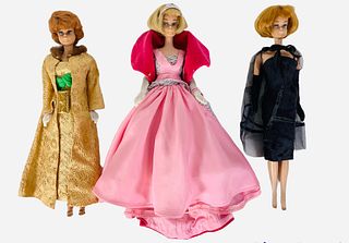 (3) Vintage Barbies with magnificent vintage outfits. (1) Beautiful Blond hair American Girl wearing Sophisticated Lady that is complete. Her right le