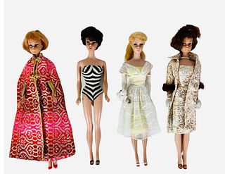 (4) Vintage Barbies including (1) Gorgeous brunette American Girl wearing Evening Splendor. Barbie has her pale lips, blue eyes and clicks 3 times. Ev