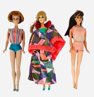 (3) Barbies including a blond TNT Talking Barbie that has had her talking device repaired so she does talk. Barbie is wearing Rainbow Wraps dress and 