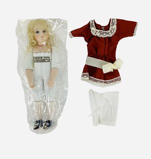 Artist reproduction Bebe Bru by Darlene Lane. 7" socket head doll on shoulderplate, mohair wig, stationary glass eyes, kid body with porcelain lower a