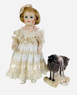 All porcelain artist doll by Jackie Lee "Ribbons and Ringlets". 17 1/2" doll with human hair wig, stationary glass eyes, closed mouth, on five-piece b