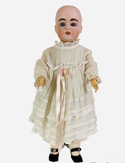Kestner 167 bisque socket head girl. 16" doll with glass sleep eyes, molded brows, open mouth with teeth, on jointed composition body stamped "Germany