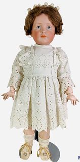 Beautiful Kammer & Reinhardt 114 bisque socket head "Gretchen". 19" doll with mohair wig, molded and painted facial features, intaglio eyes, on jointe