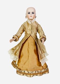Reproduction Fashion Lady. Bisque socket head on shoulderplate, stationary glass eyes, pierced ears, closed mouth, on fully jointed resin body. Nicely