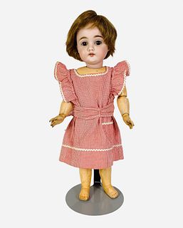 Kestner 143 bisque socket head girl. 13" doll with replaced wig, detached plaster pate, glass sleep eyes, open mouth with teeth, on jointed compositio