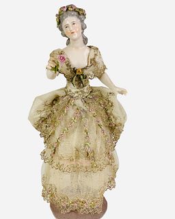 German "Hands-Away" Half Doll lady. 11 1/4" overall, molded and painted china half doll with applied floral wreath around her head and a single rose i