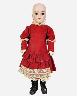 Heinrich Handwerck 109 bisque socket head child. 15 1/2" doll with glass sleep eyes, pierced ears, open mouth with teeth, on jointed composition body.
