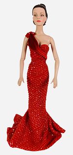 16" Tonner doll dressed in red sequins gown with red shoes. No box.