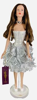 16" Tonner Tyler Wentworth Collection "Something Sleek" doll, dressed in silver ruffle dress. Has hand tag. No box.