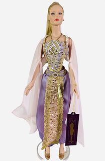 16" Tonner Tyler Wentworth Collection doll Redressed in "Princess in Disguise" purple and pink sequins outfit and gold shoes. Has hand tag. No box.