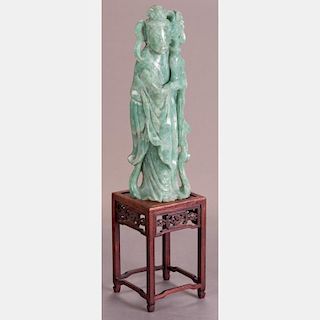 A Chinese Carved Green Nephrite Jade Figure of Guanyin on Carved Hardwood Stand.