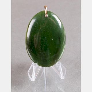 A Green Jade Pendant.