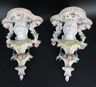 A Vintage Pair Of Porcelain Figural Wall Mounts.