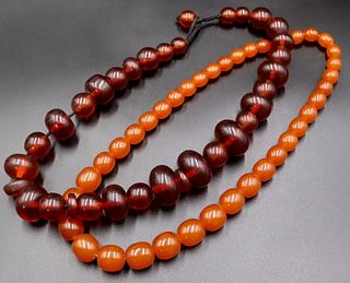 JEWELRY. (2) Chinese Amber Necklaces.