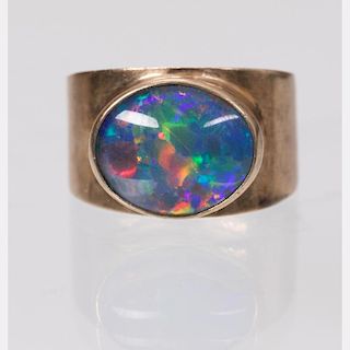 A 9kt. Yellow Gold and Opal Ring,