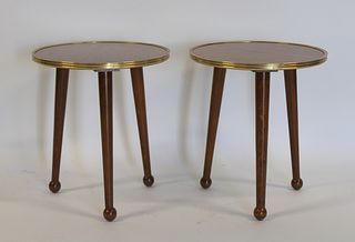 A Pair Of Side Tables With Brass Trim