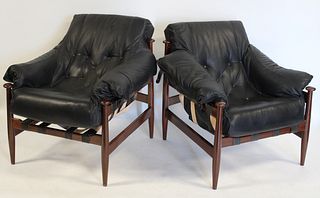A Midcentury Pair Of Mahogany Chairs With Leather