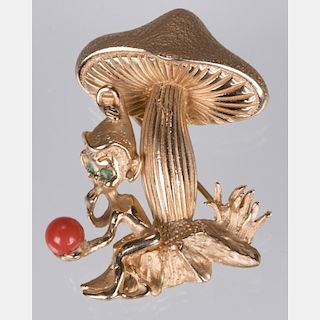 A 14kt. Yellow Gold, Coral and Emerald 'Sprite and Mushroom' Form Brooch.
