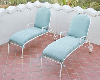 A pair of Woodard "Valencia" adjustable patio chaise lounges