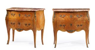 A pair of French Louis XV-style commodes