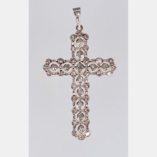 A 14kt. White Gold and Diamond Cross Form Pendant,