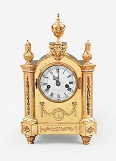 An unusual small gilt bronze mantel clock by Ellicott