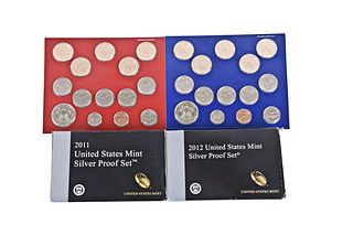 Four U.S. Mint Coin Sets