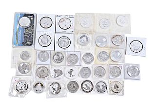 Thirty-three Assorted One Ounce Silver Coins and One Half Ounce Canandian Silver Coin