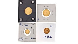Three Gold And One Gold Plated Coins