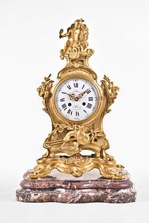 A good late 19th century French mantel clock in the rococo style signed Emile Colin & Cie