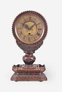 An unusual carved Asian clock with French movement