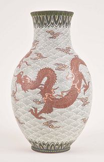 A Meiji era ovoid ceramic vase with Moriage ornament by Kinkozan