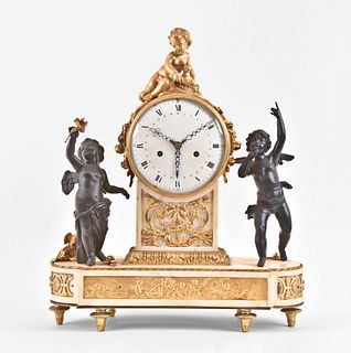 A late 18th century French bronze and marble figural mantel clock