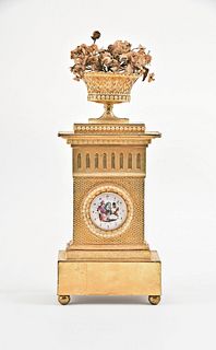 A rare early 19th century gilt card stock and Dresden trim clock