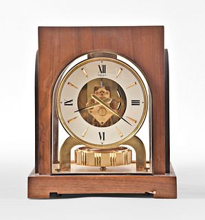 A walnut cased LeCoultre Atmos for the Gruen Guild