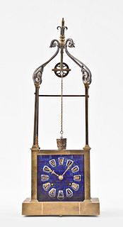 A late 19th century well form mantel clock with conical pendulum by Andre Romain Guilmet