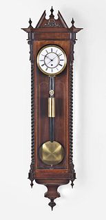 A mid 19th century month going weight driven Vienna regulator timepiece