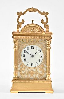An unusual and decorative early 20th century hour repeating carriage clock