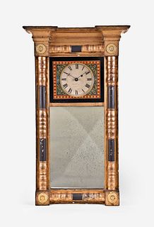 A 19th century New Hampshire mirror clock by James Cary Brunswick Maine