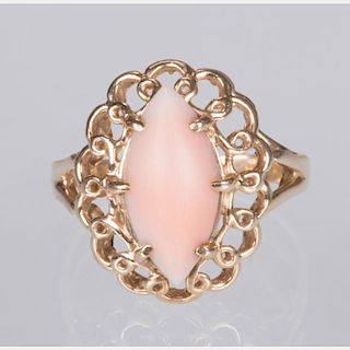 A 14kt. Yellow Gold and Coral Ring.