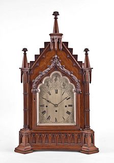 A late 19th century English Gothic style bracket clock chiming on eight bells