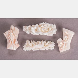 A Group of Four Chinese Carved Coral Brooches.