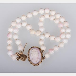 A Double Strand White and Pink Coral Beaded and Cameo Bracelet,